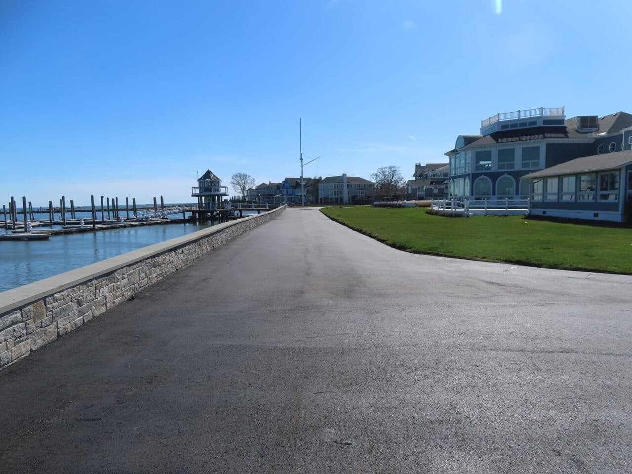 Residential Driveway Paving project in Pine Orchard, CT — finished waterfront road along seawall