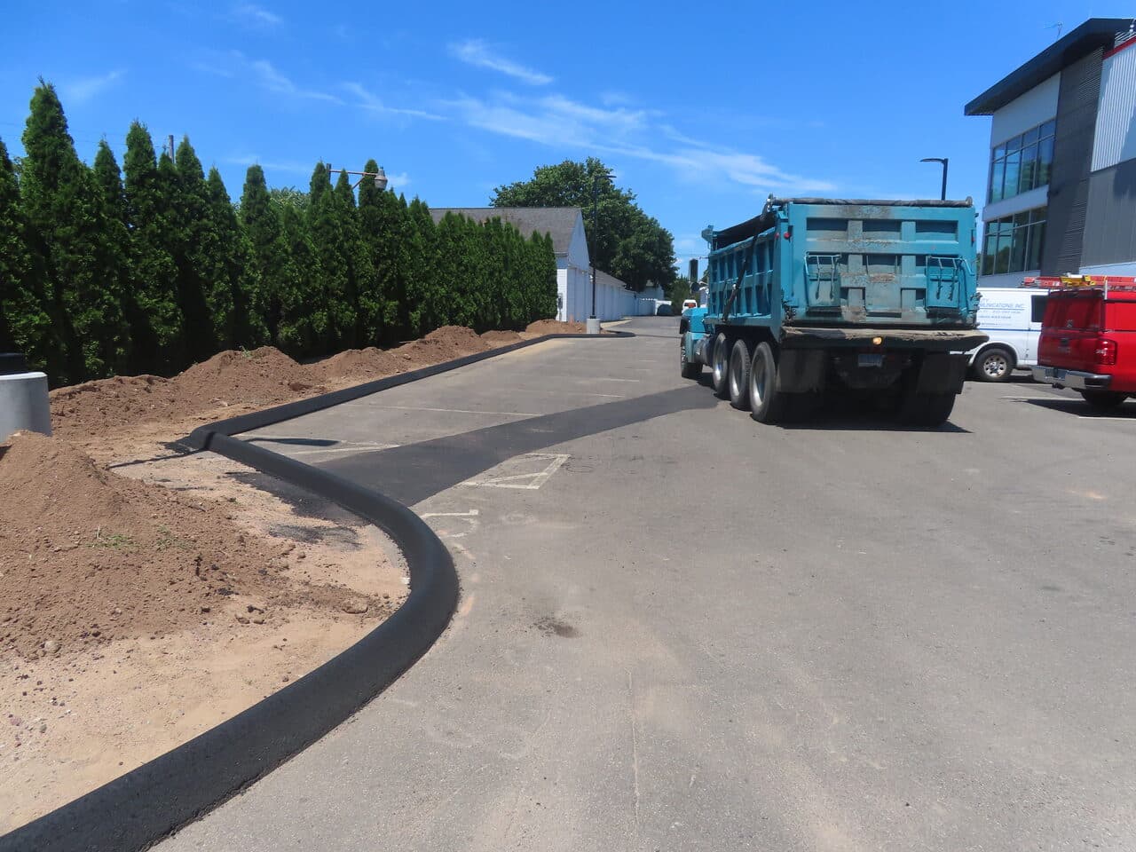 Commercial Parking Lot Repair & Patching project in Wallingford, CT — new curb line and paved lot