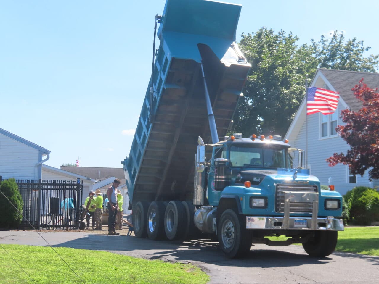 Commercial Parking Lot Repair & Patching project in Wallingford, CT — dump truck delivering asphalt residential