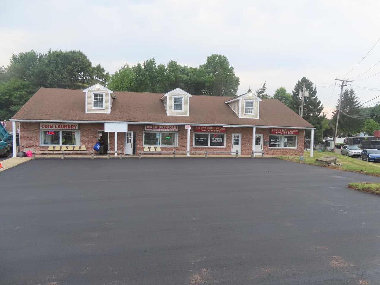 Commercial Plaza Paving project in New Haven, CT — finished paved lot at strip plaza