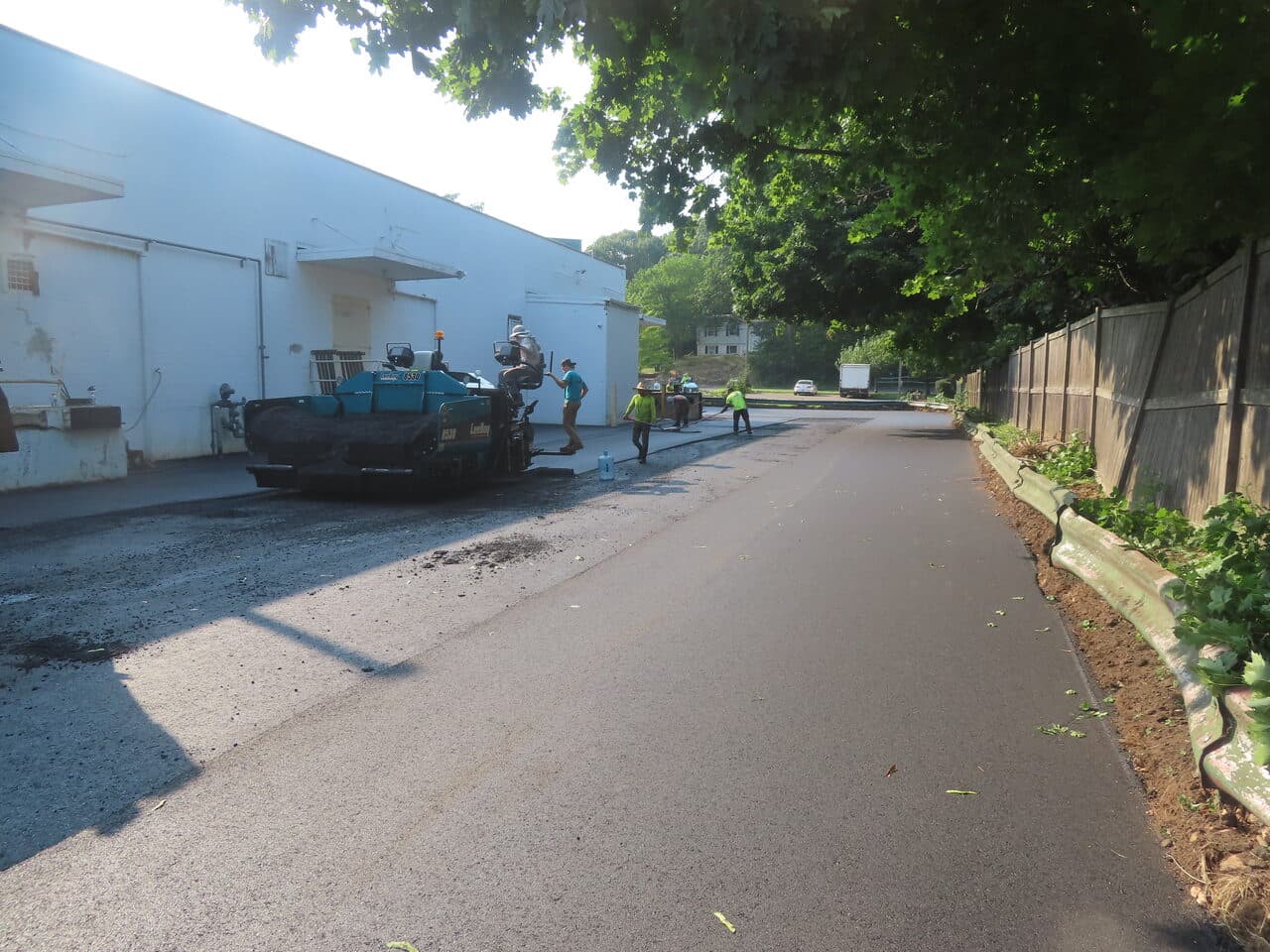 Commercial Parking Lot Paving project in Branford, CT — paving alongside commercial building