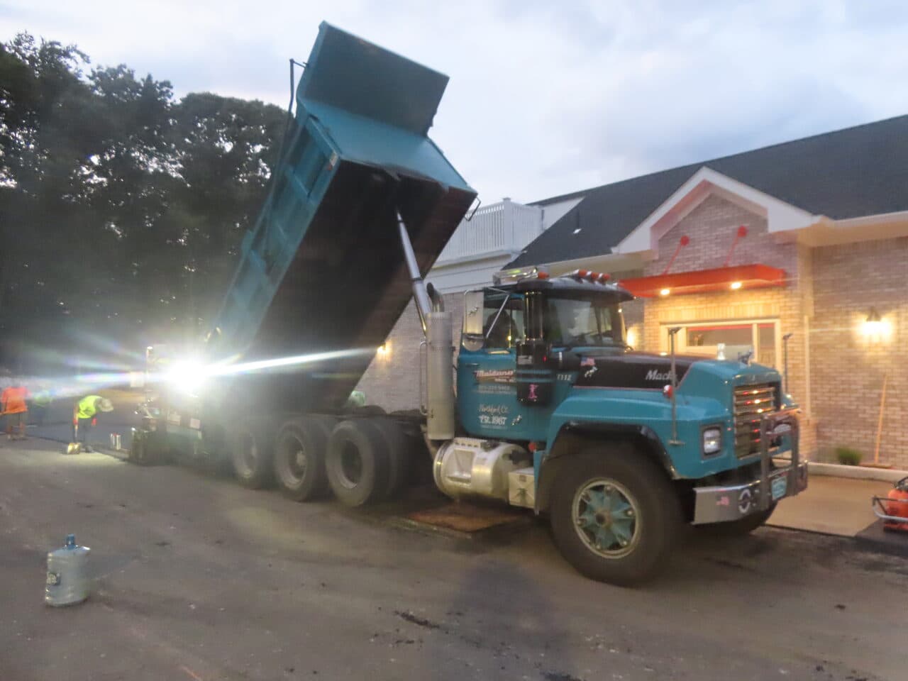 Commercial Parking Lot Paving project in Guilford, CT — Maisano dump truck at Dunkin site