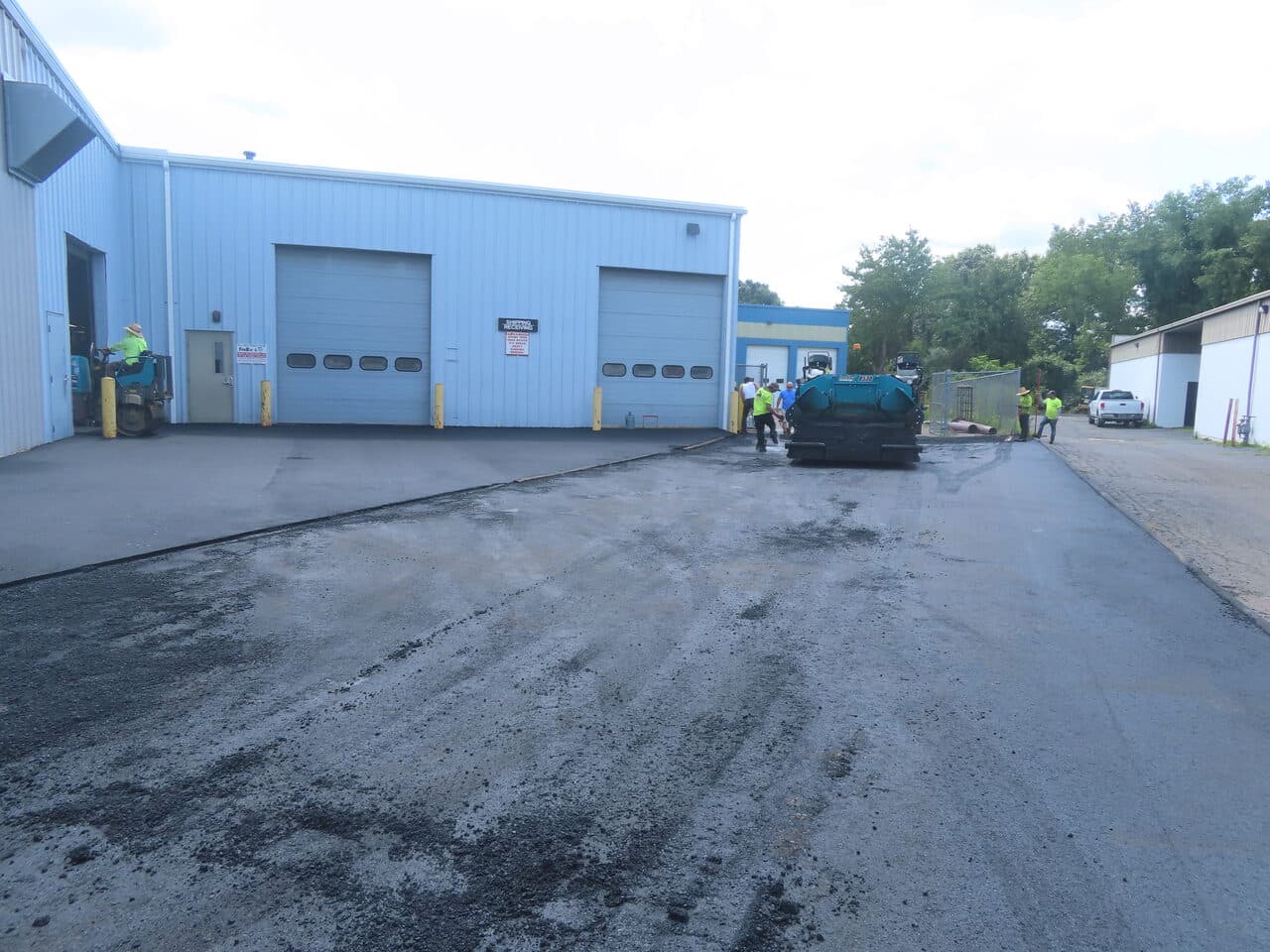 Commercial Parking Lot Paving project in North Haven, CT — fresh asphalt lot with paver