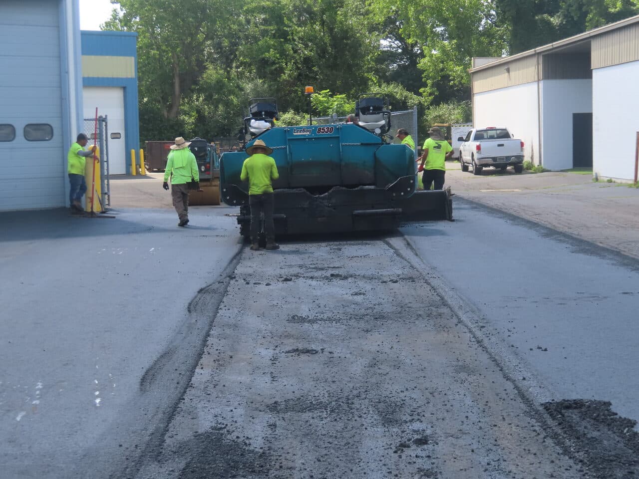 Commercial Parking Lot Paving project in North Haven, CT — crew paving with LeeBoy paver