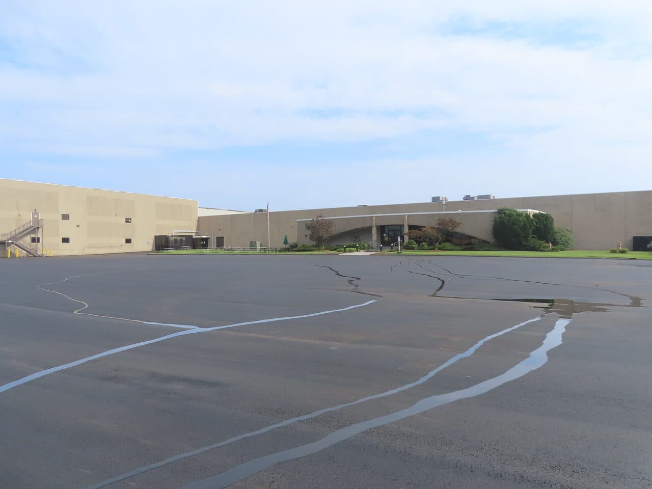 Commercial Parking Lot Paving project in East Haven, CT — finished lot with building entrance