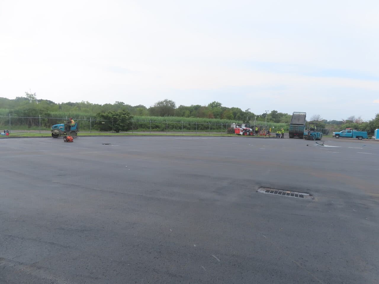 Commercial Parking Lot Paving project in East Haven, CT — crew and equipment staging on lot