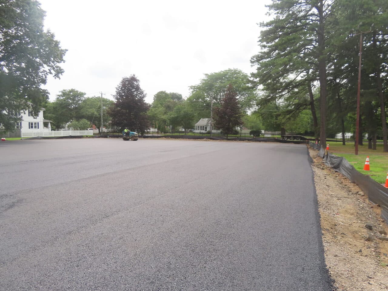 Commercial Parking Lot Paving project in Springfield, MA — wide finished asphalt parking lot