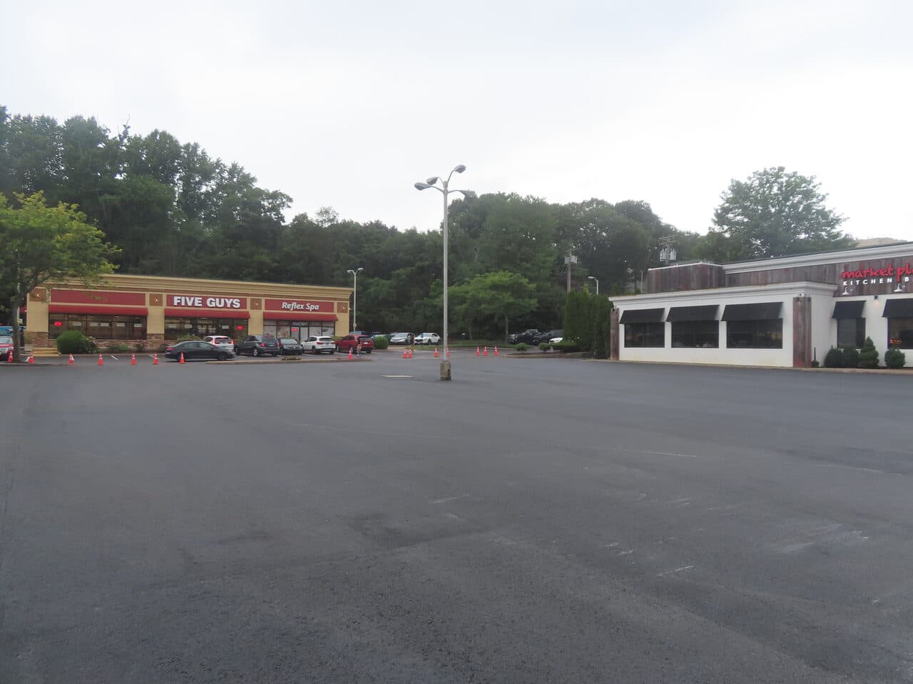 Commercial Parking Lot Paving project in Shelton, CT — finished paved plaza lot