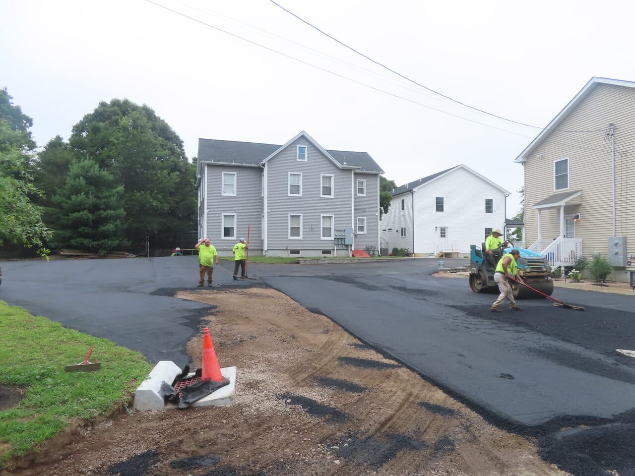 Commercial Parking Lot Paving project in Branford, CT — fresh asphalt lot with crew