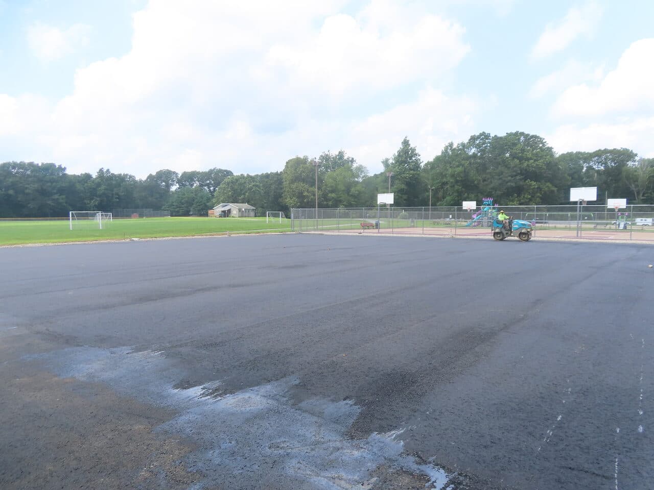 Commercial Parking Lot Paving project in Brooklyn, CT — finished lot near playground