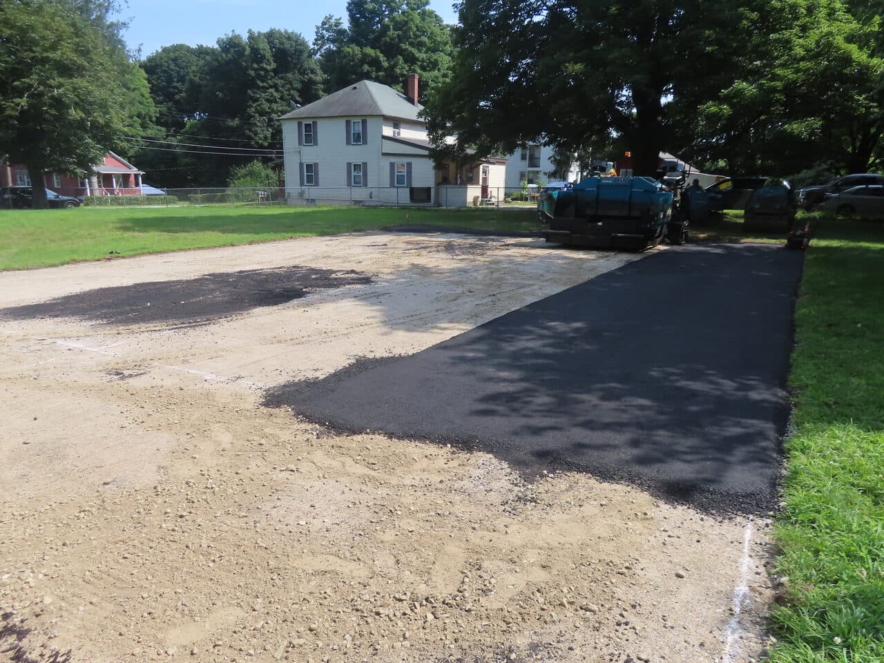 Before — Commercial Parking Lot Paving in Brooklyn, CT (paving in progress near house)