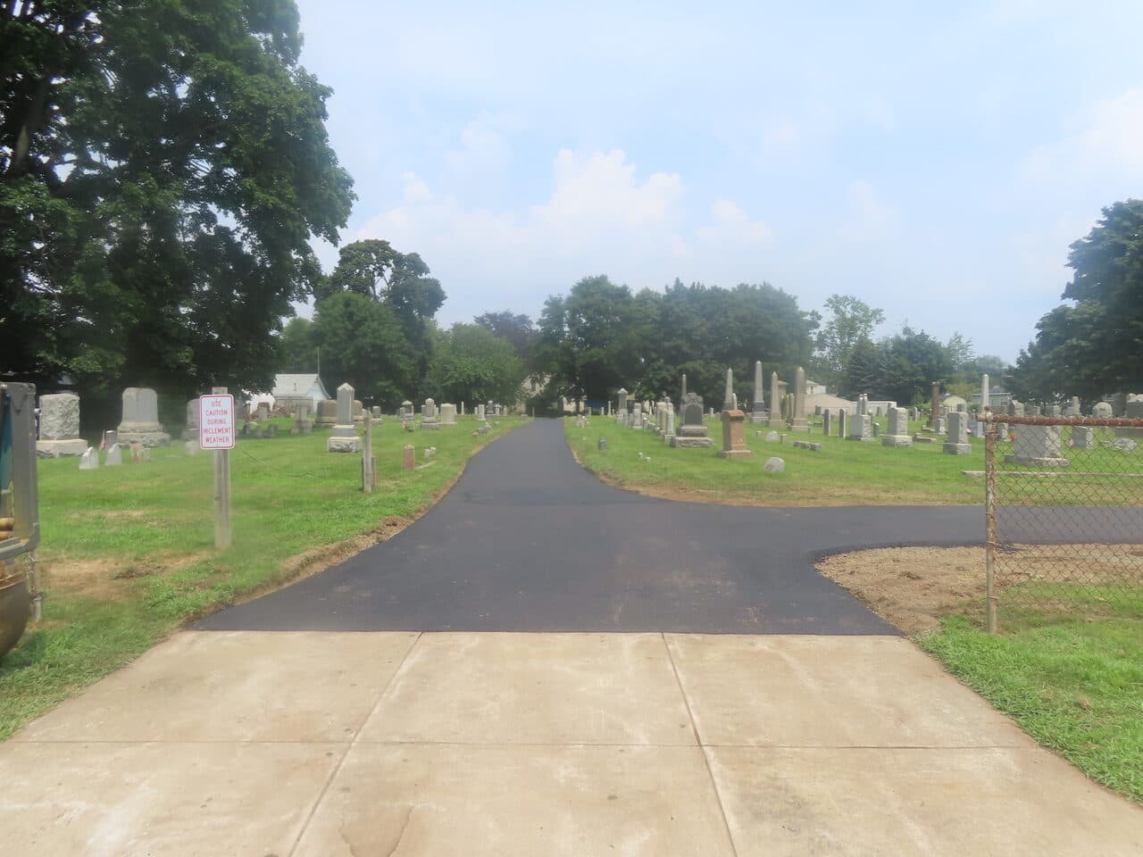 Cemetery Roadway & Walkway Paving project in East Haven, CT — finished paved cemetery road intersection