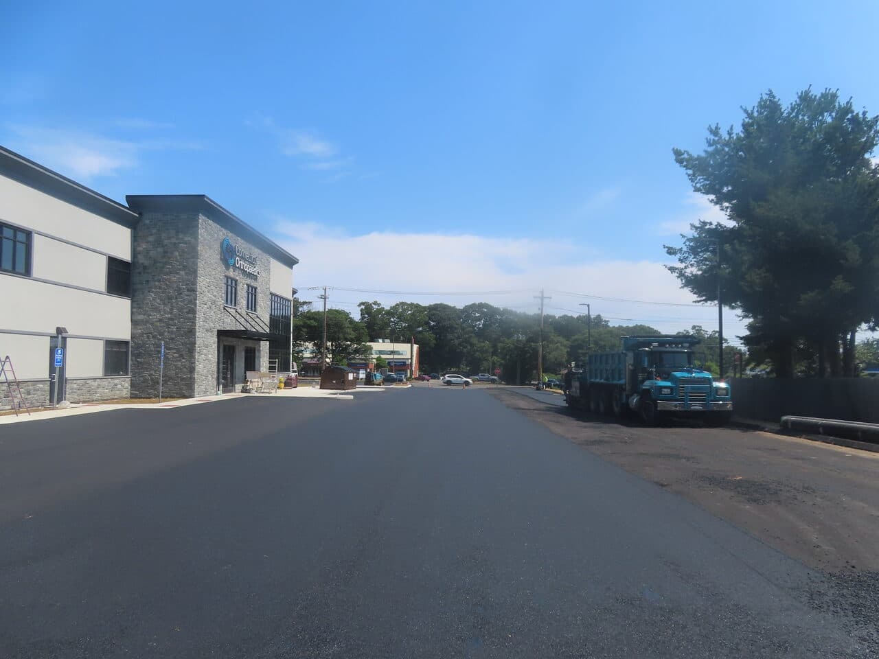 Commercial Parking Lot Paving project in Orange, CT — fresh asphalt lot at medical building