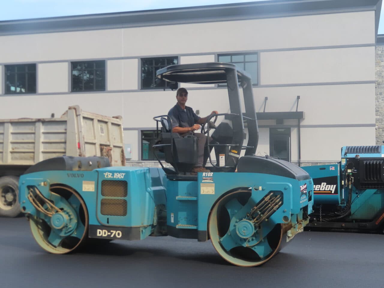 Commercial Parking Lot Paving project in Orange, CT — Volvo DD-70 roller on fresh asphalt