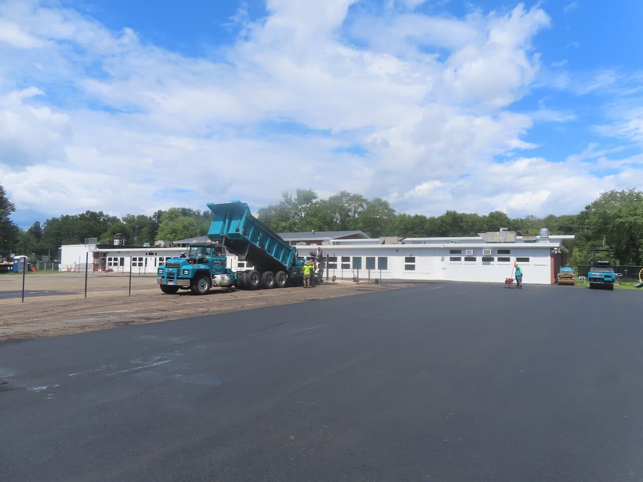 Commercial Parking Lot Paving project in Bloomfield, CT — wide view of lot paving operation