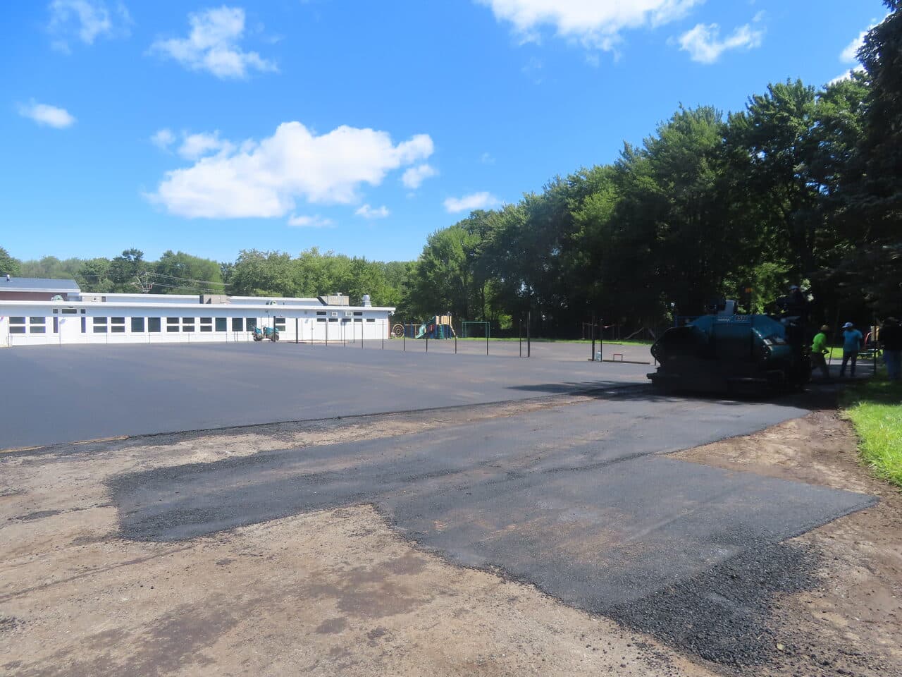 Commercial Parking Lot Paving project in Bloomfield, CT — school lot fresh asphalt edge