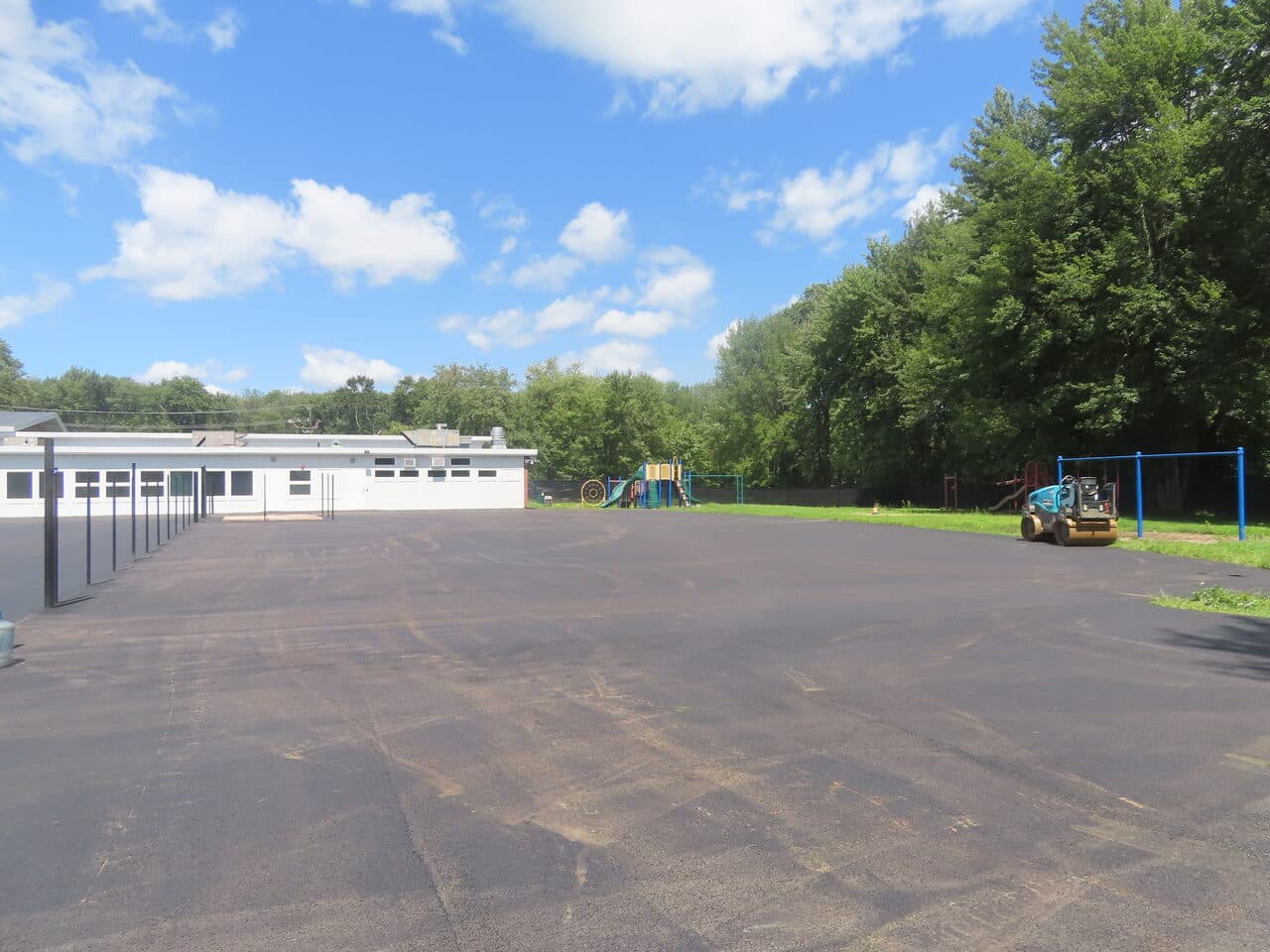 Commercial Parking Lot Paving project in Bloomfield, CT — finished school parking lot wide