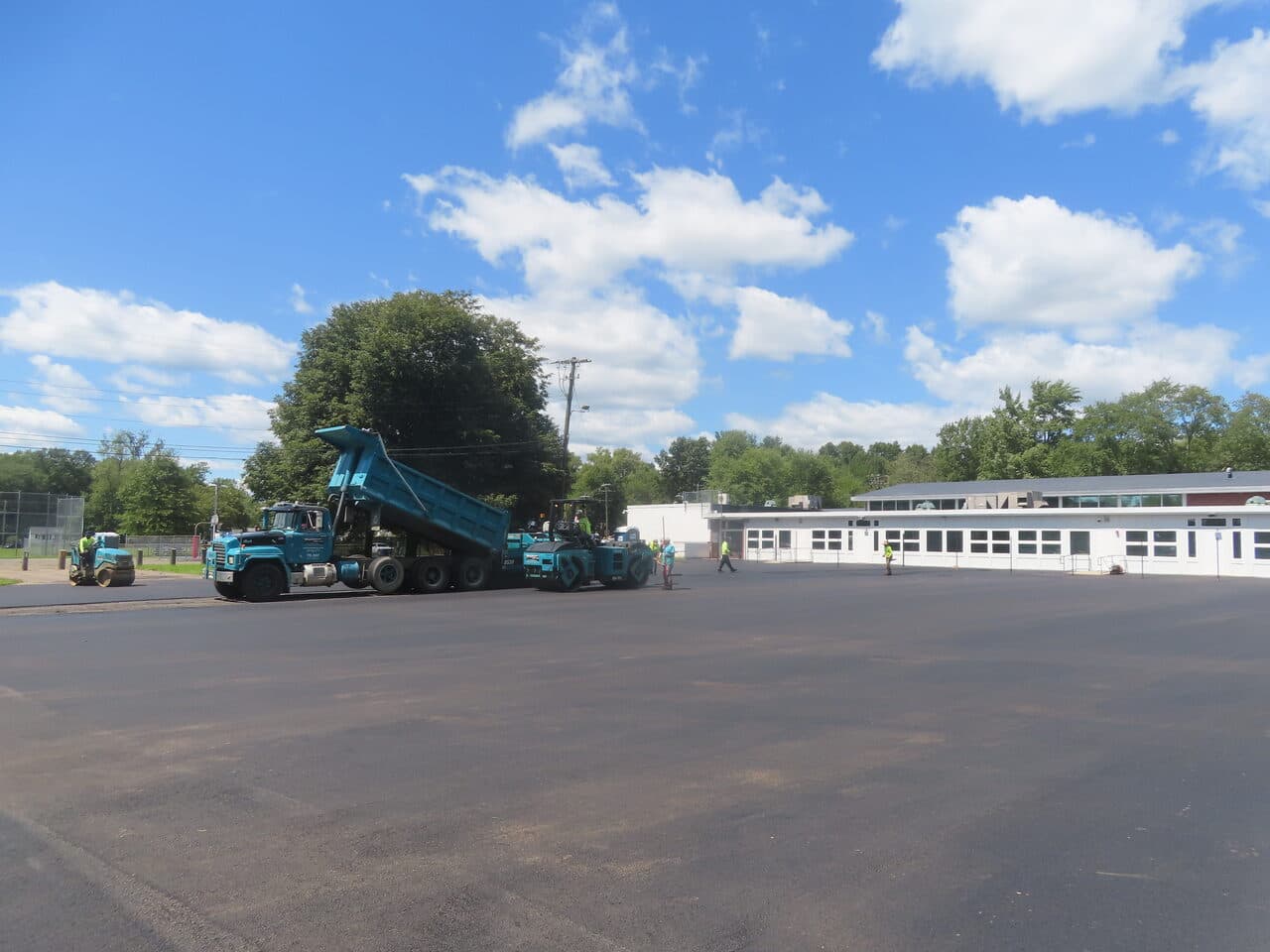 Commercial Parking Lot Paving project in Bloomfield, CT — paving lot beside school building