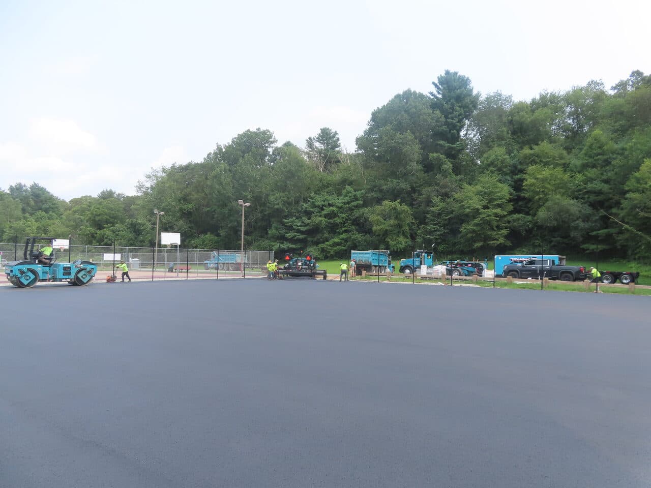 Commercial Parking Lot Paving project in Brooklyn, CT — wide finished asphalt lot