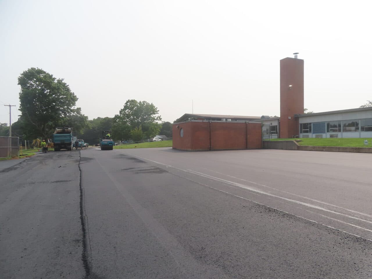 Commercial Parking Lot Paving project in Montowese, CT — finished asphalt lot at school