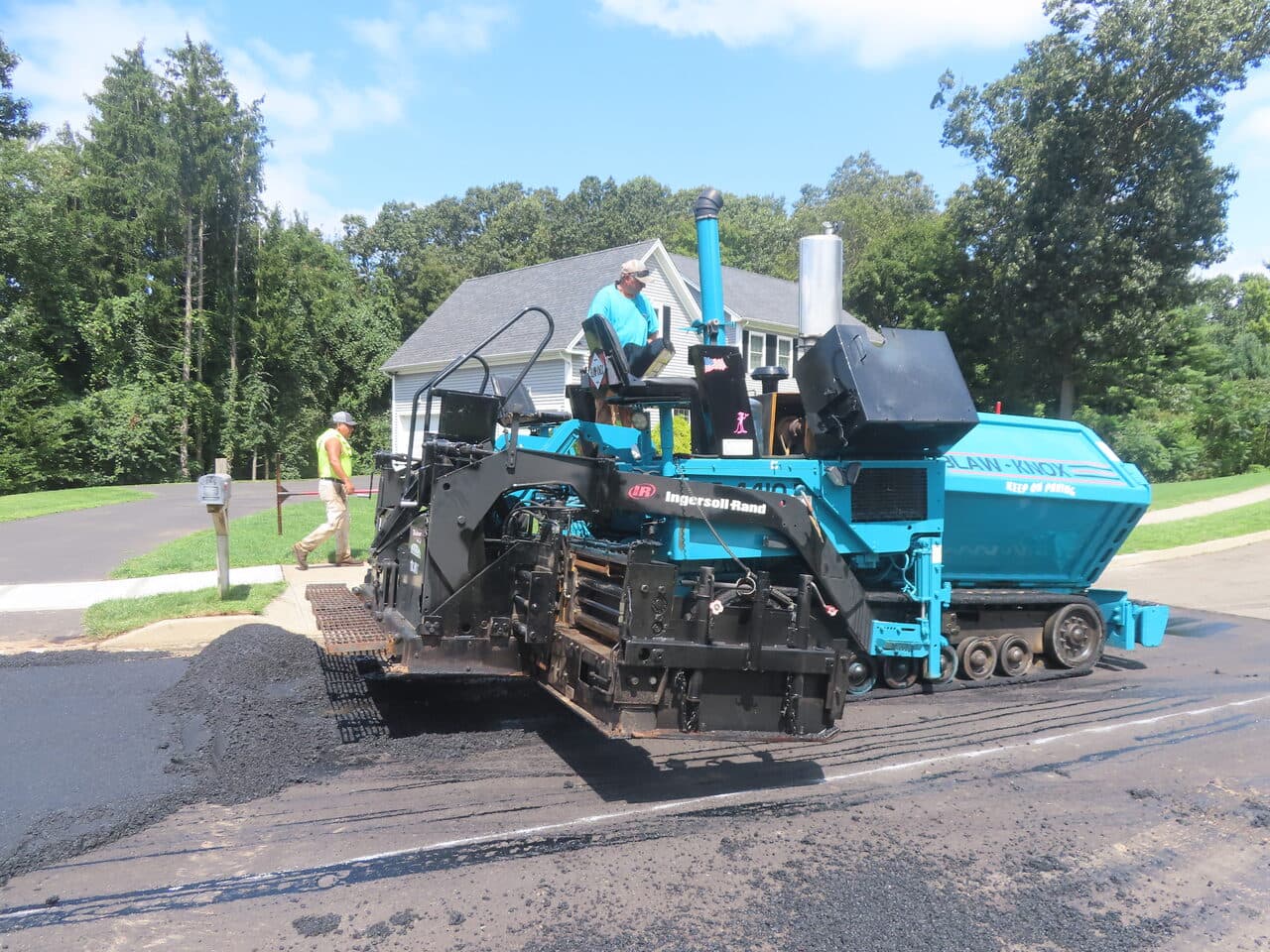 Roadway Paving project in Cheshire, CT — blau-knox paver laying asphalt