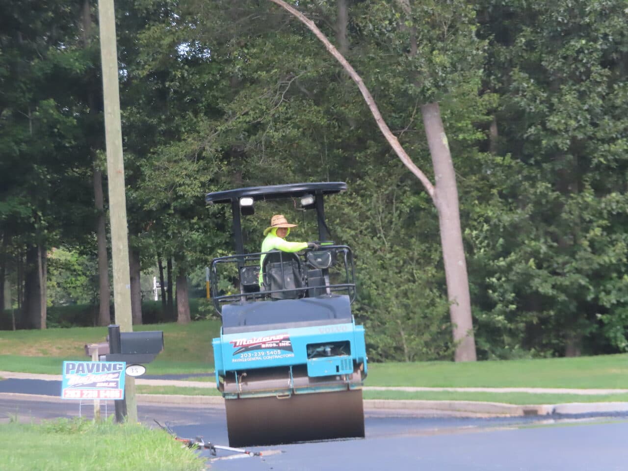 Roadway Paving project in Cheshire, CT — roller compacting fresh asphalt