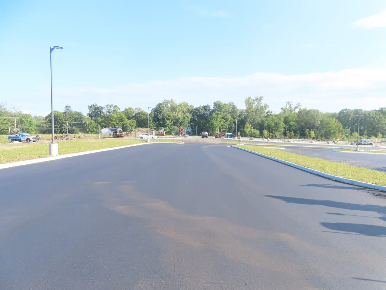 Commercial Parking Lot Paving project in Brookfield, CT — fresh paved drive aisle wide