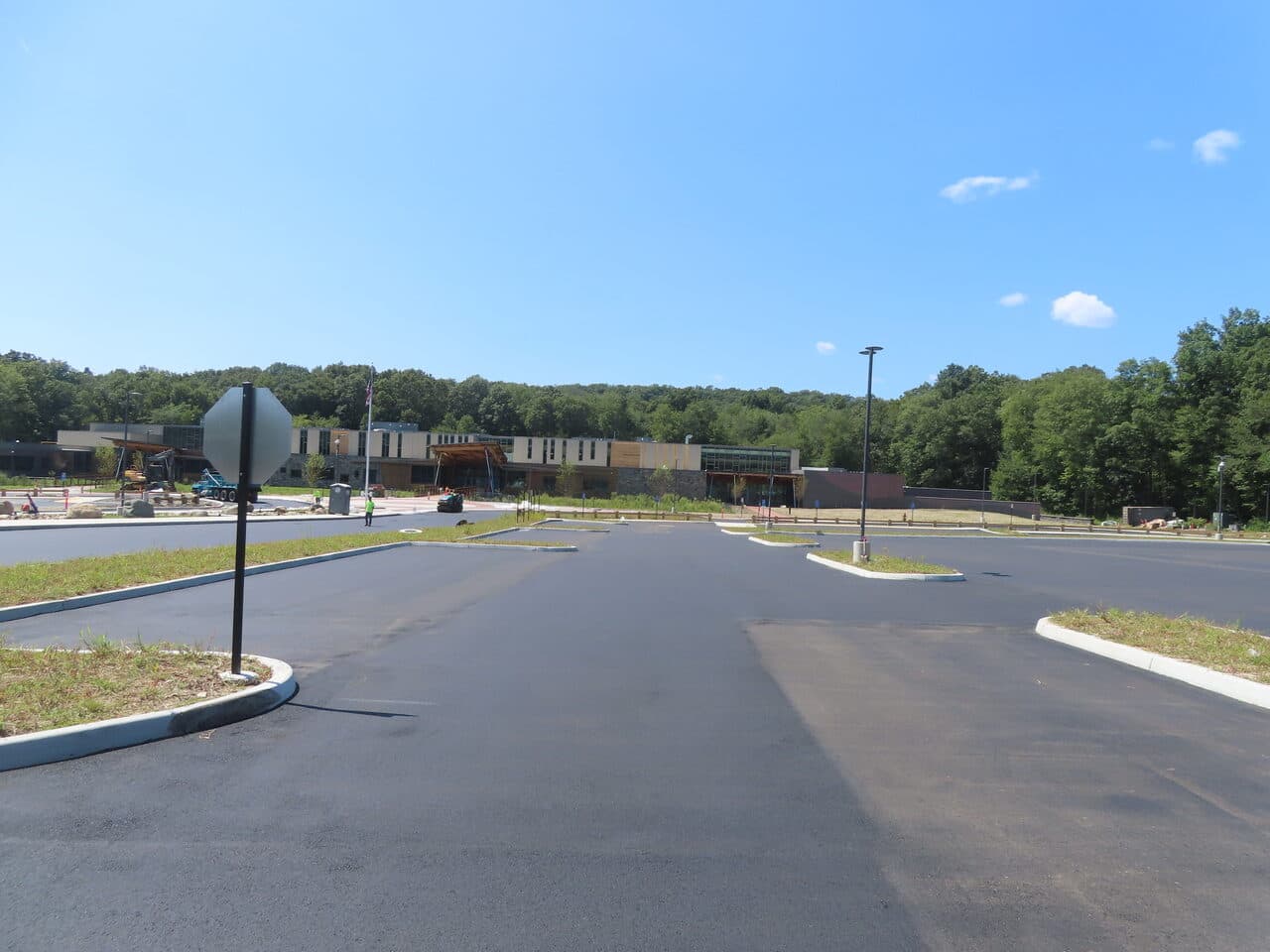 Commercial Parking Lot Paving project in Brookfield, CT — finished lot with stop sign