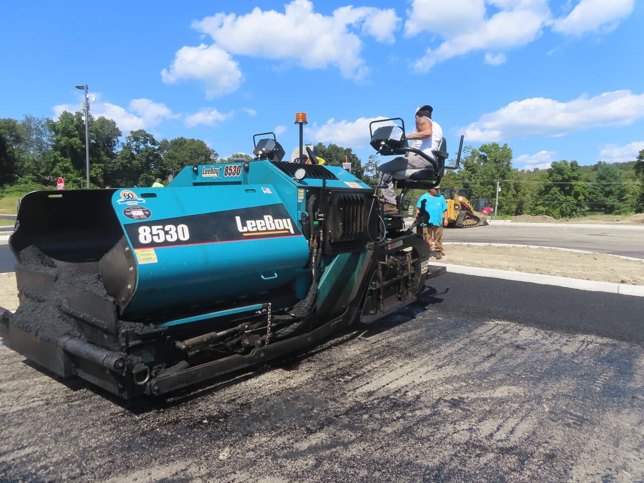 Commercial Parking Lot Paving project in Brookfield, CT — LeeBoy 8530 paver closeup