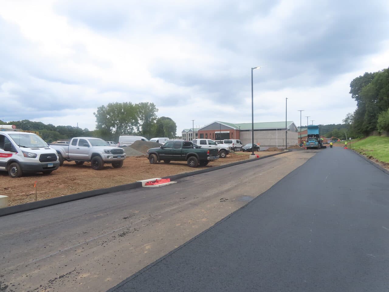 Commercial Parking Lot Paving project in North Branford, CT — new road with parked vehicles