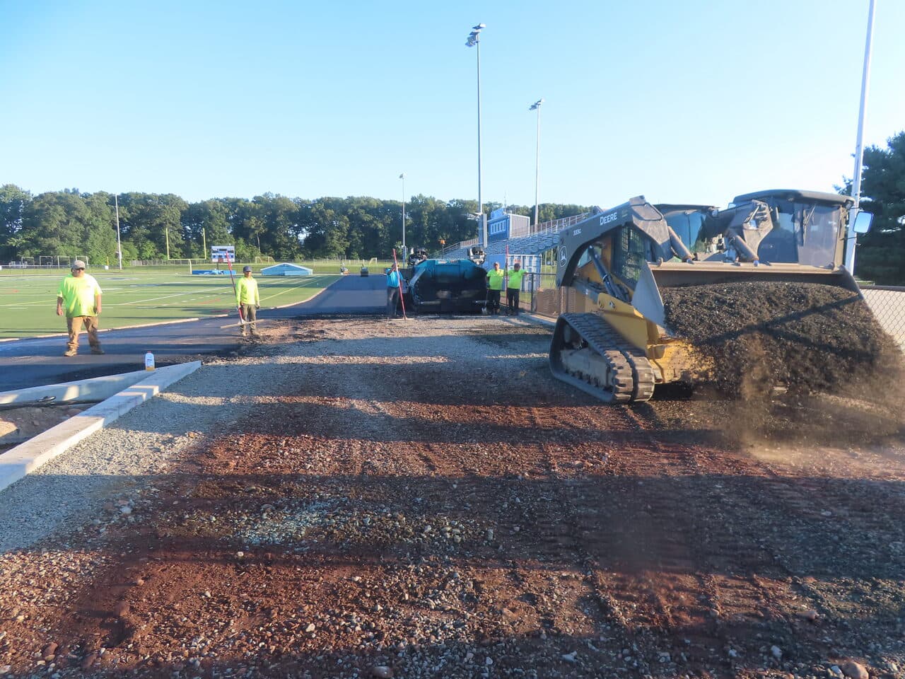 Athletic Surface Base Paving project in Southington, CT — stone base grading near field