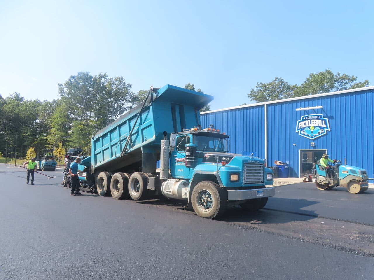 Commercial Parking Lot Paving project in Plainville, CT — truck and paver at Camp Pickleball