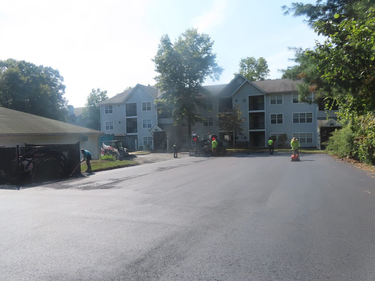 Commercial Parking Lot Paving project in Hamden, CT — fresh paved drive lane at apartments