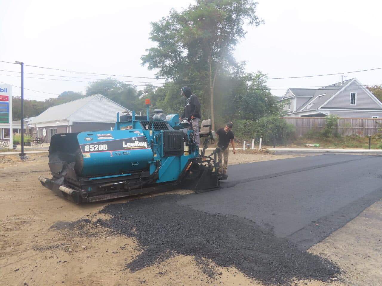 Commercial Parking Lot Paving project in Old Lyme, CT — LeeBoy paver laying asphalt