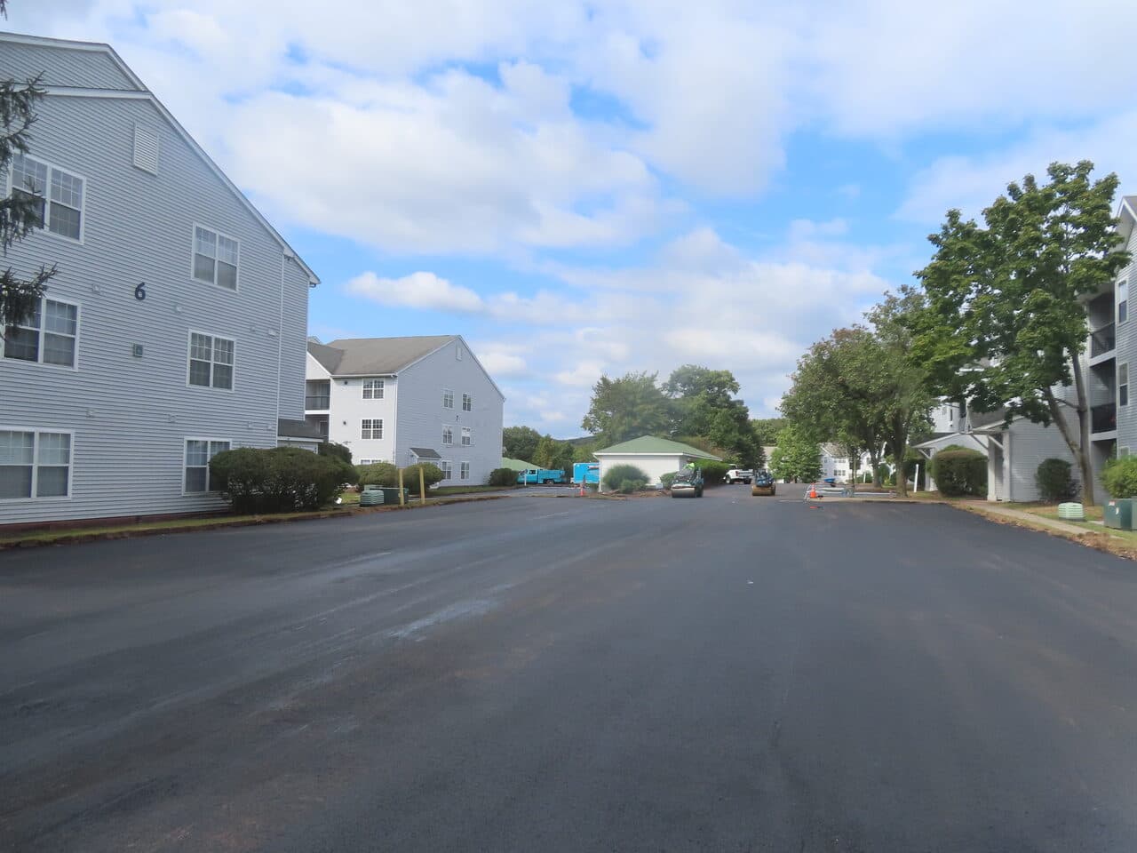 HOA Parking Lot Paving project in Hamden, CT — finished paved community road