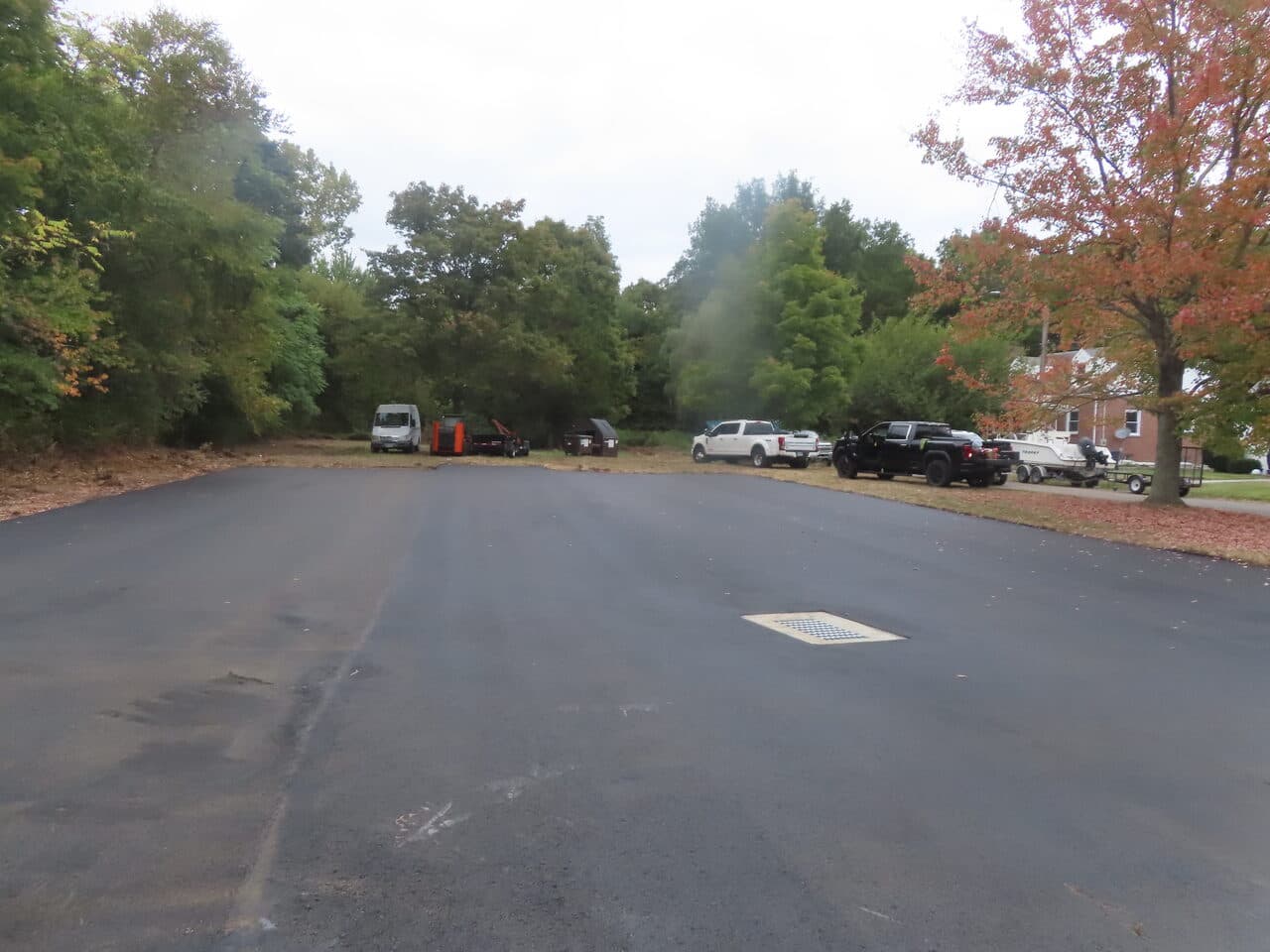 Commercial Parking Lot Paving project in Branford, CT — finished fresh asphalt parking area