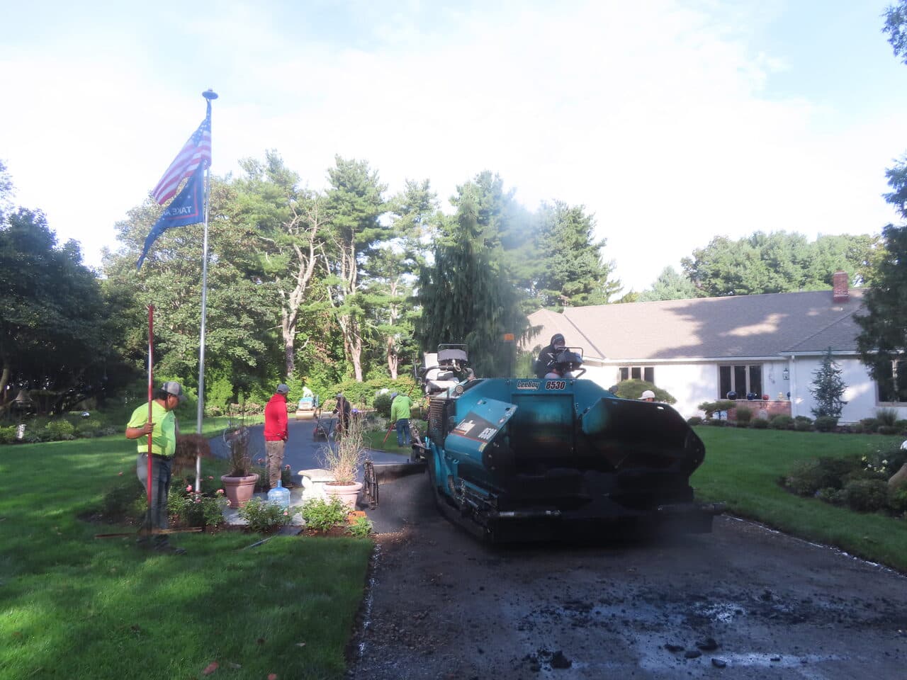 Residential Driveway Paving project in Branford, CT — asphalt paver laying driveway