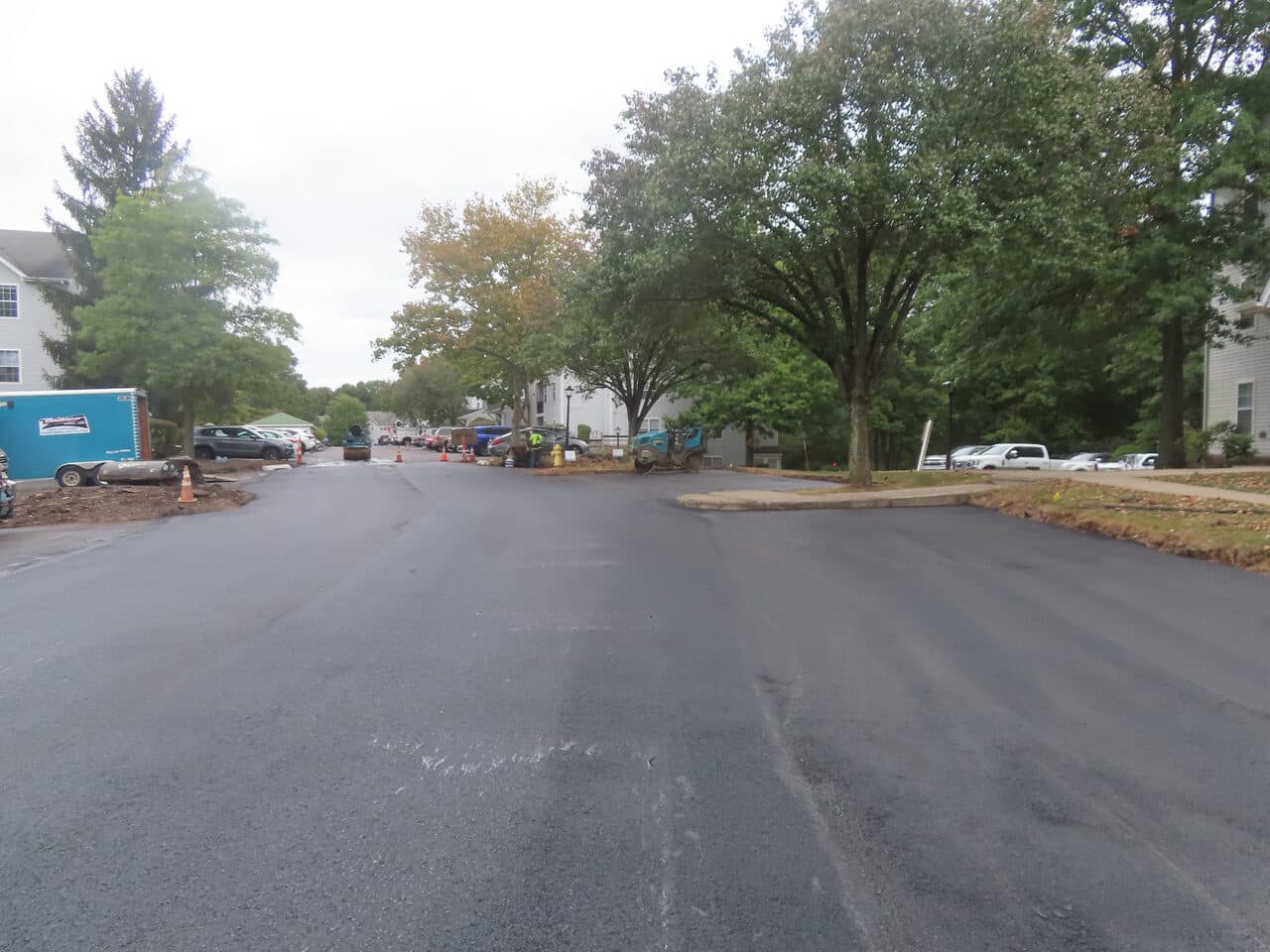 Commercial Parking Lot Paving project in Hamden, CT — fresh asphalt drive aisle apartments