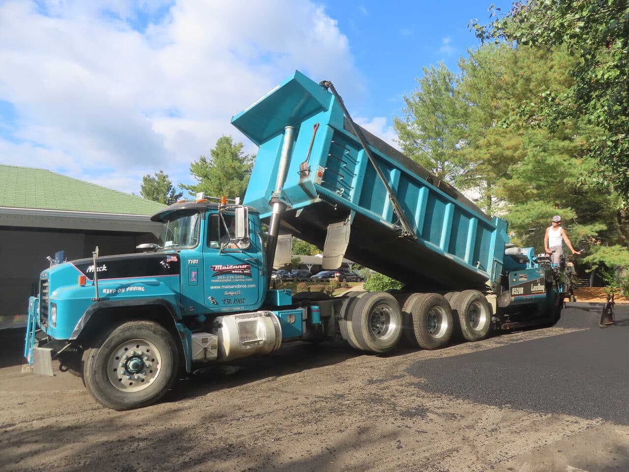 Commercial Parking Lot Paving project in Hamden, CT — Maisano dump truck and paver on driveway