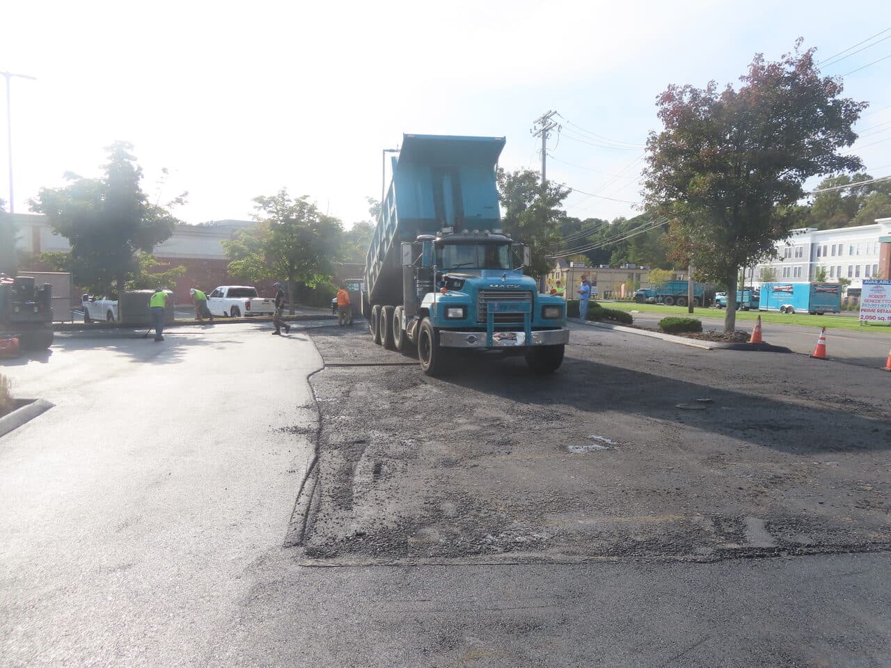 Before — Commercial Parking Lot Paving in Orange, CT (dump truck on milled lot surface)