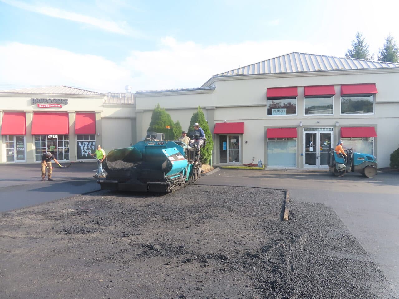 After — Commercial Parking Lot Paving in Orange, CT (dump truck on milled lot surface)