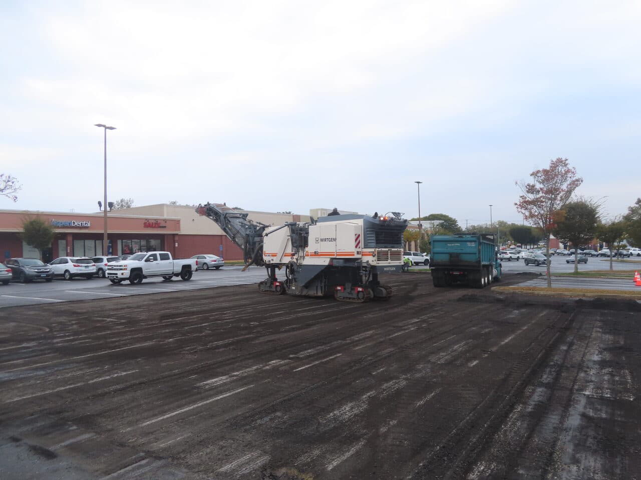 Commercial Parking Lot Paving project in Farmington, CT — milling machine and dump truck working