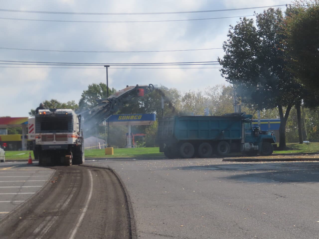 Commercial Parking Lot Paving project in Farmington, CT — milling near Sunoco station with dust