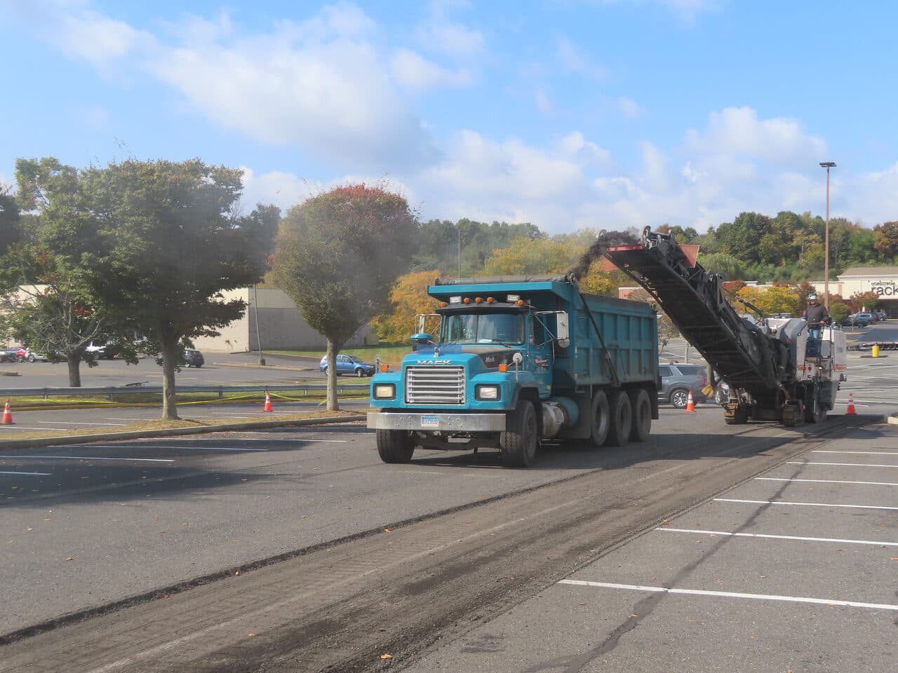 Commercial Parking Lot Paving project in Farmington, CT — Mack dump truck beside cold planer