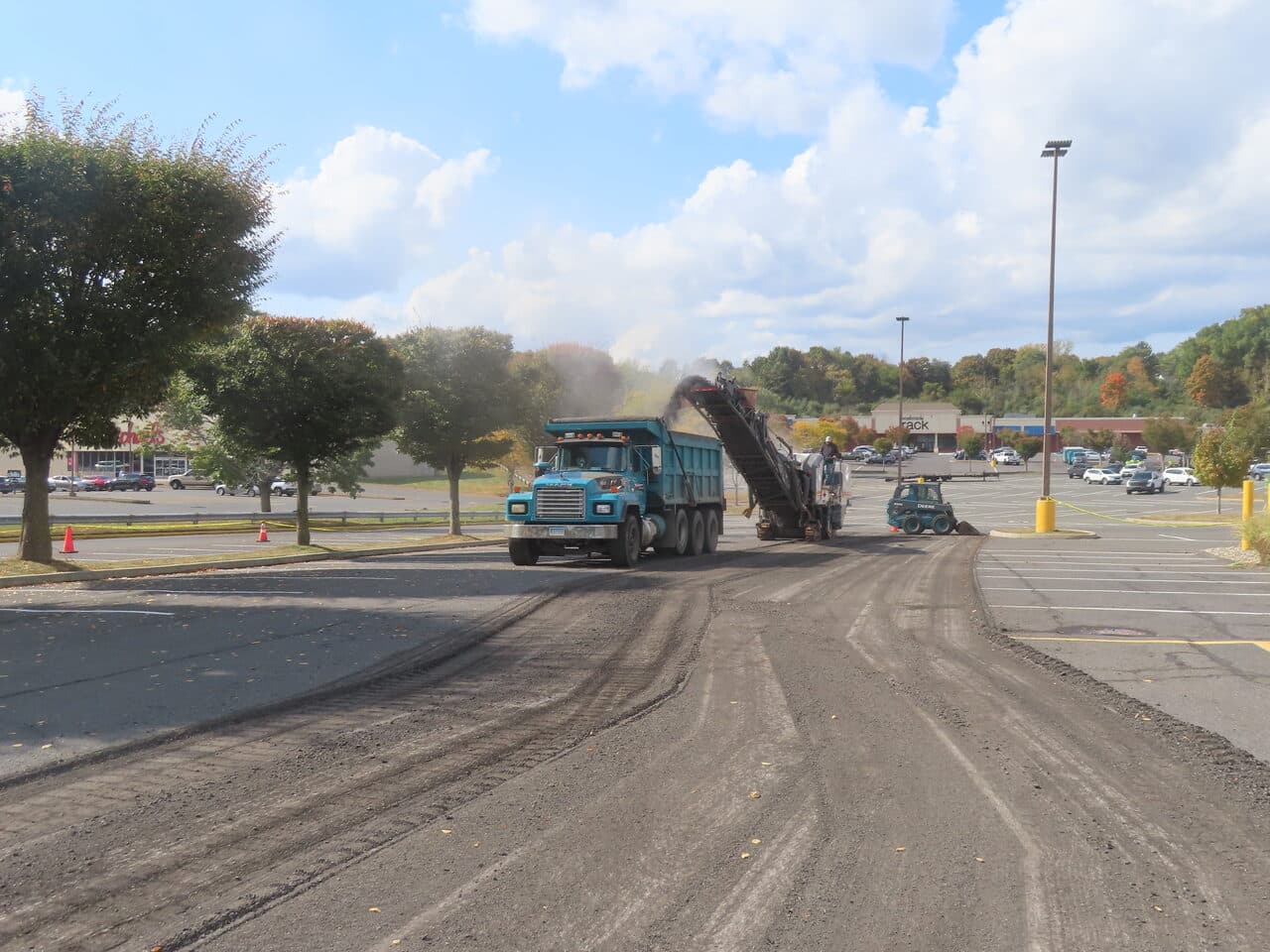 Commercial Parking Lot Paving project in Farmington, CT — dump truck and miller in lot