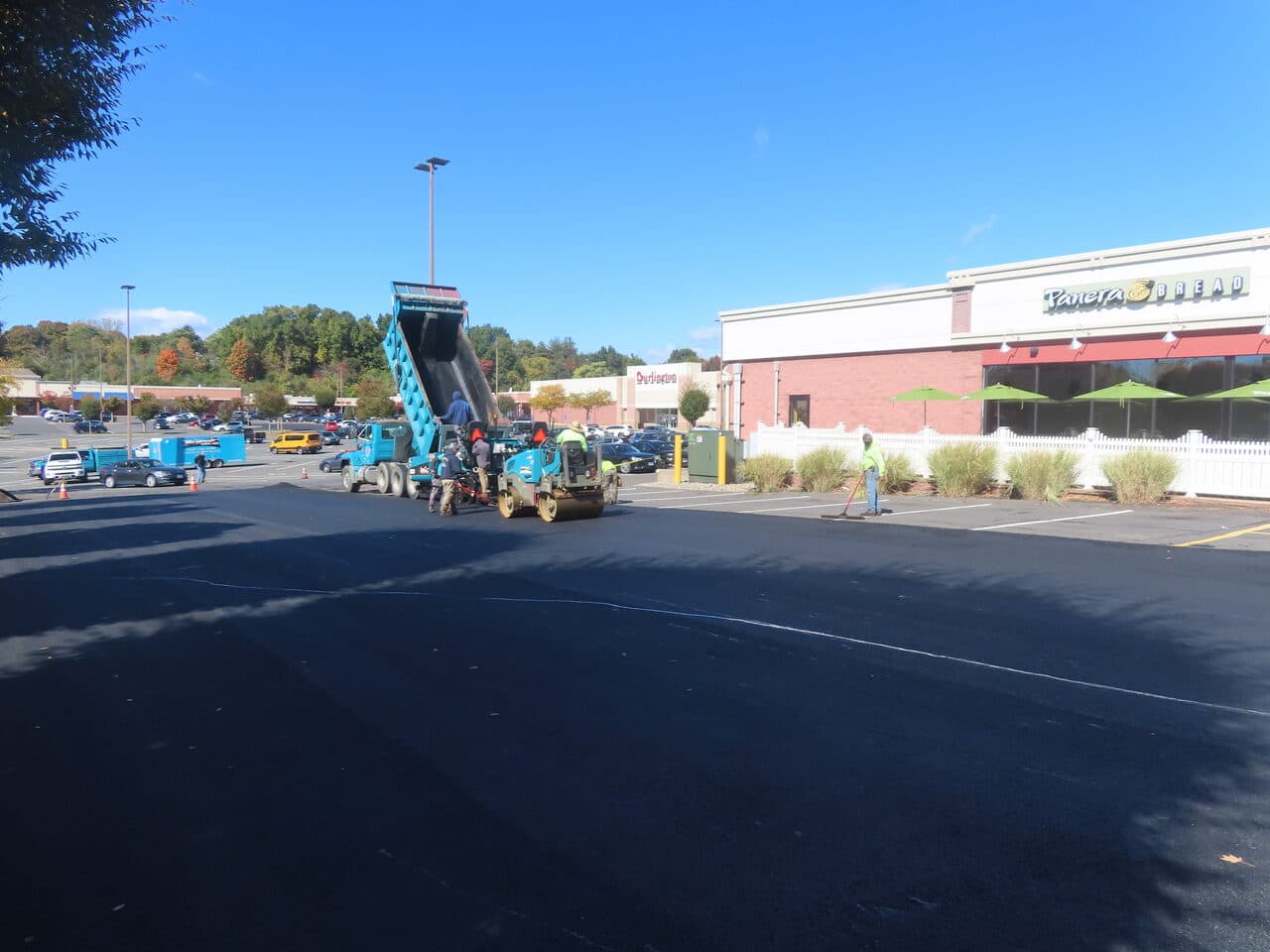 Commercial Parking Lot Paving project in Farmington, CT — fresh asphalt at Panera plaza