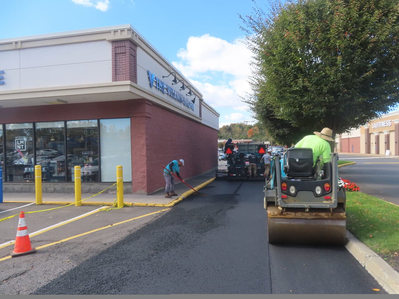 Commercial Parking Lot Paving project in Farmington, CT — paving along storefront curb