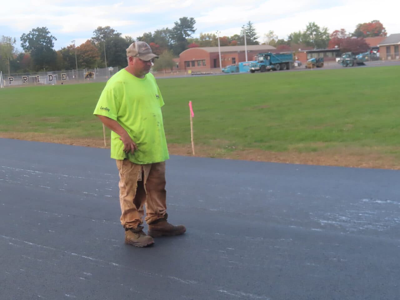 Athletic Surface Base Paving project in East Windsor, CT — foreman on finished track