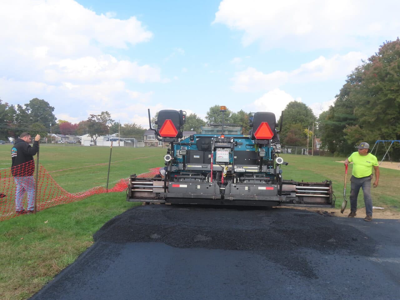 Commercial Parking Lot Paving project in West Haven, CT — paver edge with safety fence