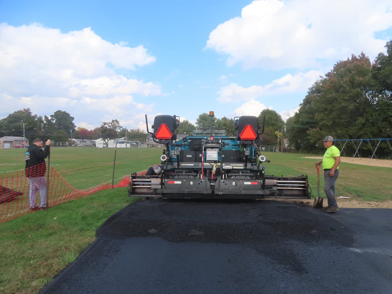 Commercial Parking Lot Paving project in West Haven, CT — rear view of paver laying mat